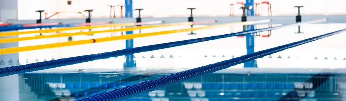 Panorama of a competition pool with lane ropes