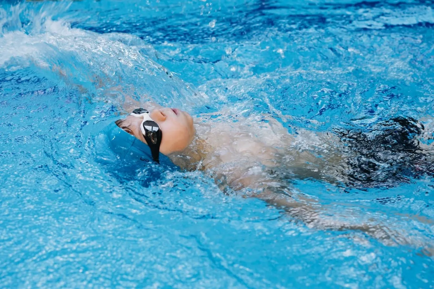 Swimmer doing backstroke