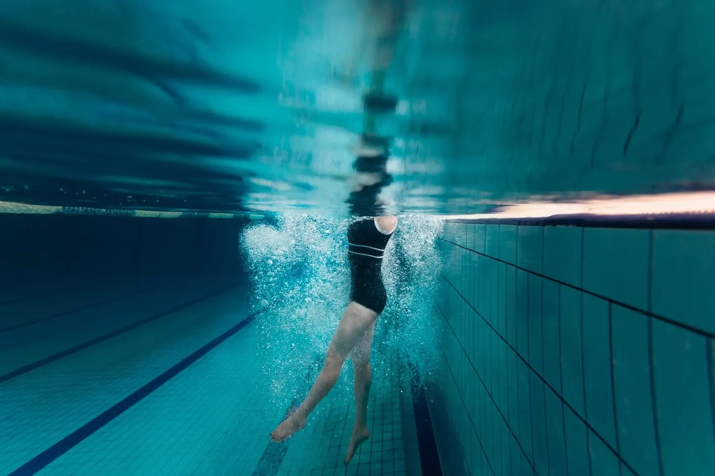 Swimmer doing a flutter kick, seen underwater