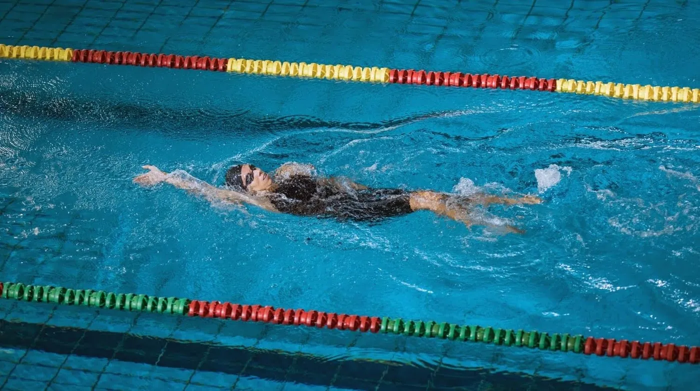 Swimmer doing freestyle with the head down