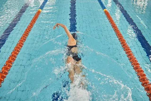 Swimmer doing freestyle in a lane