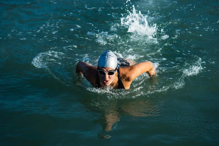 Woman swimming the butterfly stroke