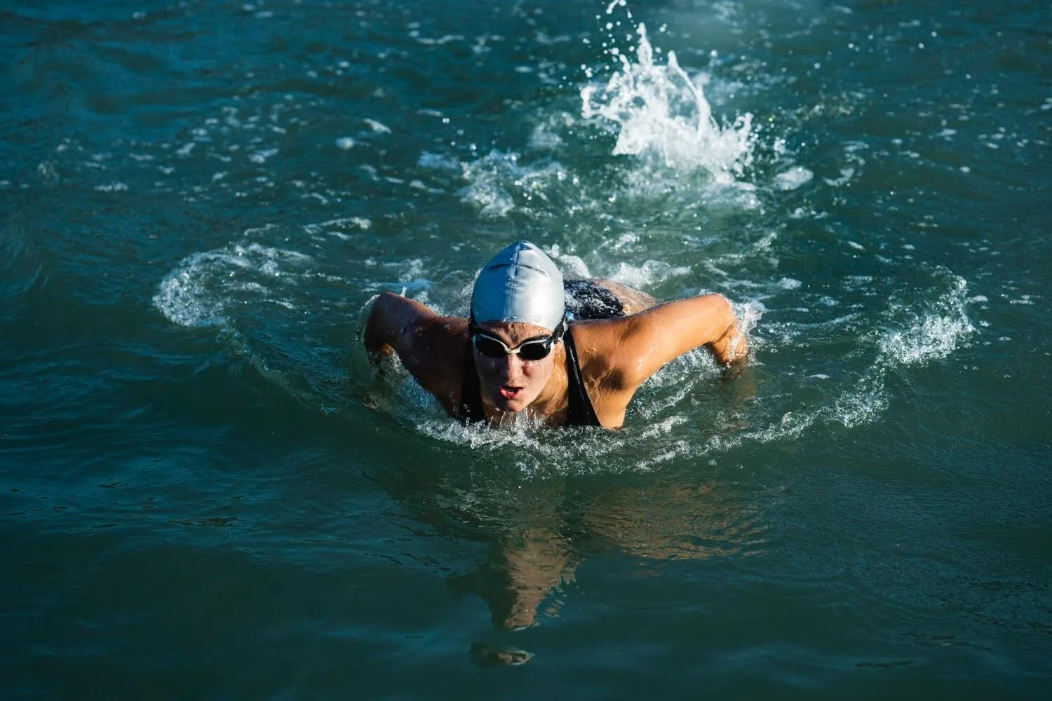 Woman swimming breaststroke