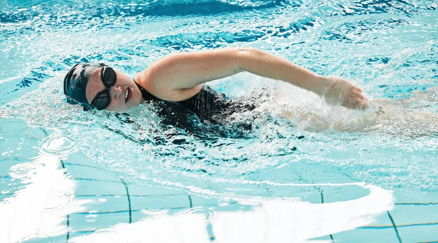 Woman swimming freestyle